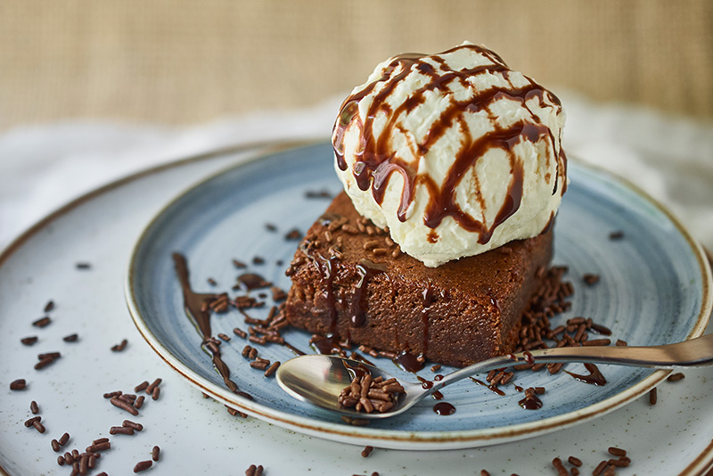 Brownie with ice cream.